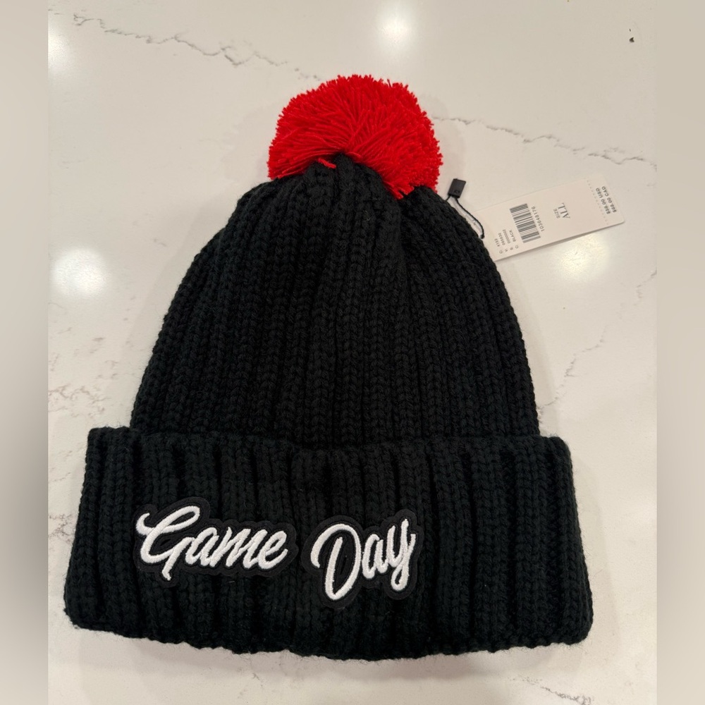 Anthropologie Black Knit Pom Beanie with Red Pom and 'Game Day' Patch NWT